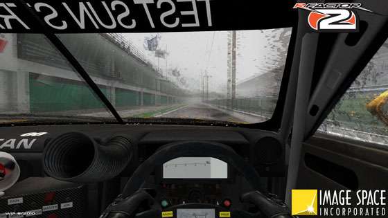 rFactor 2: rain effects on the windscreen in an unidentified Nissan GT or Touring Car, peeking outside into a wet and empty pitlane.